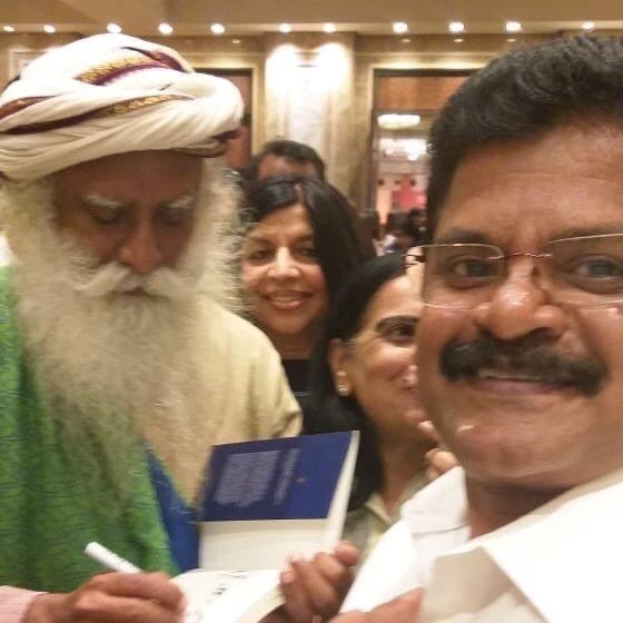 Vedic Astrologer E.K. Dhilip Kumar with spiritual leader Sadhguru